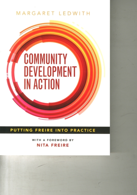 Image for Community Development in Action : Putting Freire into Practice